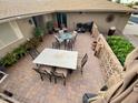 Spacious flagstone patio with seating area, perfect for outdoor entertaining at 10511 W Tropicana Cir, Sun City, AZ 85351