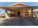 Covered carport and entrance to ranch style home at 13635 N Emberwood Dr, Sun City, AZ 85351