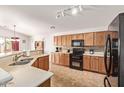 Well-equipped kitchen with modern appliances and ample counter space at 25564 W Ripple Rd, Buckeye, AZ 85326