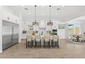 Spacious kitchen boasts modern appliances and a large island with seating at 39015 N 6Th Dr, Phoenix, AZ 85086