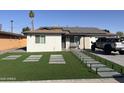 Remodeled home with artificial turf and solar panels at 4016 W Wagon Wheel Dr, Phoenix, AZ 85051