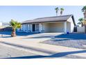 Single-story home with carport and desert landscaping at 625 E Judi Dr, Casa Grande, AZ 85122