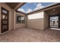 Private courtyard entrance with brick pavers and a tranquil atmosphere at 853 W Golden Ore Pass, Apache Junction, AZ 85120