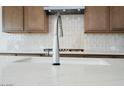 Modern kitchen sink and faucet with sleek, contemporary design at 853 W Golden Ore Pass, Apache Junction, AZ 85120