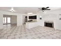 Living room with fireplace and tile flooring at 1312 E Coolidge St, Phoenix, AZ 85014