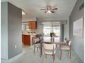 Bright dining area adjacent to the kitchen, perfect for entertaining at 14702 W Buttonwood Dr, Sun City West, AZ 85375