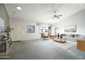 Spacious living room featuring a neutral color palette and ample natural light at 14702 W Buttonwood Dr, Sun City West, AZ 85375