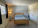 Cozy bedroom with a double bed and ample natural light at 2524 S El Paradiso -- # 106, Mesa, AZ 85202