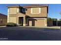 Two-story house with a two-car garage and landscaped front yard at 2826 E Augusta Ave, Chandler, AZ 85249