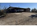 House with covered parking and desert landscaping at 42213 N 3Rd St, Phoenix, AZ 85086