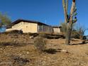 Ranch-style home with desert landscaping and mountain views at 42213 N 3Rd St, Phoenix, AZ 85086