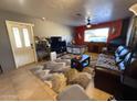 Spacious living room with large TV at 42213 N 3Rd St, Phoenix, AZ 85086