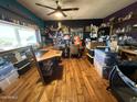 Home office with wood flooring and large window at 42213 N 3Rd St, Phoenix, AZ 85086