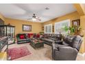 Comfortable living room with sectional sofa and large windows at 4547 E Sodalite St, San Tan Valley, AZ 85143