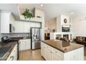 Spacious kitchen featuring granite countertops and stainless steel appliances at 7105 E Hibiscus Way, Scottsdale, AZ 85266