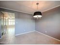 Bright dining area with tile floors and chandelier at 8225 N Central Ave # 46, Phoenix, AZ 85020