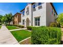 Two-story house with well-maintained landscaping at 875 S Brewer Dr, Gilbert, AZ 85296