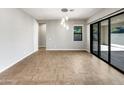 Spacious dining area with sliding glass doors to backyard at 925 E Piedmont Rd, Phoenix, AZ 85042