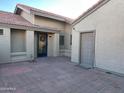 Front entry with decorative door and access to storage at 945 N Pasadena St # 113, Mesa, AZ 85201