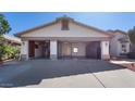 Three car garage with open doors and plenty of space at 2705 E Verbena Dr, Phoenix, AZ 85048
