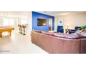 Game room with a pool table, comfortable seating, and a home bar at 2806 N 82Nd St, Scottsdale, AZ 85257
