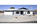 Charming single story home with a well maintained front yard at 8144 E Kilarea Ave, Mesa, AZ 85209