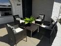 Inviting front porch with seating area, perfect for enjoying outdoor relaxation at 8144 E Kilarea Ave, Mesa, AZ 85209