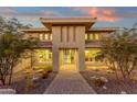 Modern two-story home with a paver walkway leading to the front entrance at 10031 N Palisades Blvd, Fountain Hills, AZ 85268