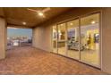 Covered patio with sliding glass doors leading to the kitchen and living areas at 10031 N Palisades Blvd, Fountain Hills, AZ 85268