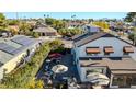 Aerial view highlighting a home's expansive backyard with patio and pool, perfect for outdoor entertaining at 13232 N 54Th Dr, Glendale, AZ 85304