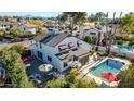 An aerial view showcasing a home's backyard oasis, complete with a refreshing pool and relaxing patio at 13232 N 54Th Dr, Glendale, AZ 85304