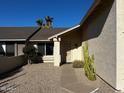 House exterior showing walkway and entrance with cacti at 1638 E Sandra Ter, Phoenix, AZ 85022