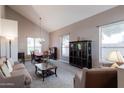 Bright living room featuring a dining area and ample natural light at 16636 S 34Th Way, Phoenix, AZ 85048