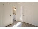 Light and bright entryway with updated half bathroom at 19241 N 4Th Pl, Phoenix, AZ 85024