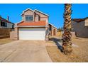 Two-story house with attached garage and desert landscaping at 19241 N 4Th Pl, Phoenix, AZ 85024