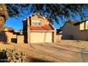 Two-story house with attached garage and desert landscaping at 19241 N 4Th Pl, Phoenix, AZ 85024