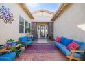 Relaxing front courtyard with seating and vibrant decor at 22917 E Camina Buena Vis, Queen Creek, AZ 85142