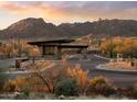 Gated community entrance with mountain views at sunset at 24642 N 123Rd Pl, Scottsdale, AZ 85255