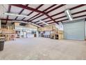 Spacious workshop featuring a loft and ample storage at 2602 S 226Th Dr, Buckeye, AZ 85326