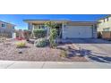 Charming home with a landscaped yard and neutral color scheme at 3740 S 182Nd Ln, Goodyear, AZ 85338