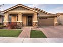 House exterior featuring a covered porch and brick driveway at 3894 E Ebano St, Gilbert, AZ 85295