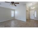 Bright living room with tile flooring and neutral walls at 44865 W Horse Mesa Rd, Maricopa, AZ 85139