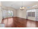 Formal dining room with hardwood floors and large windows at 4601 E Peak View Rd, Cave Creek, AZ 85331