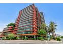 Modern high-rise building with orange and glass accents at 4808 N 24Th St # 803, Phoenix, AZ 85016