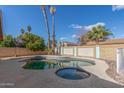 Inviting kidney-shaped pool with a spa and a brick patio at 4944 E Windrose Dr, Scottsdale, AZ 85254