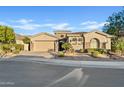 Stunning curb appeal of this two-story home features a three-car garage at 5045 S Mingus Pl, Chandler, AZ 85249