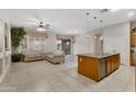 Kitchen with island, stainless steel appliances, and wood cabinets at 1971 E Yellowstone Pl, Chandler, AZ 85249