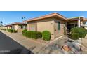 Tan single story home with walkway and landscaping at 13232 N 98Th Ave # N, Sun City, AZ 85351