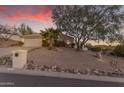 Single story house with a garage and desert landscaping at 15859 N Nyack Dr, Fountain Hills, AZ 85268