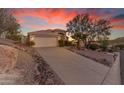 House exterior featuring a driveway and desert landscaping at 15859 N Nyack Dr, Fountain Hills, AZ 85268